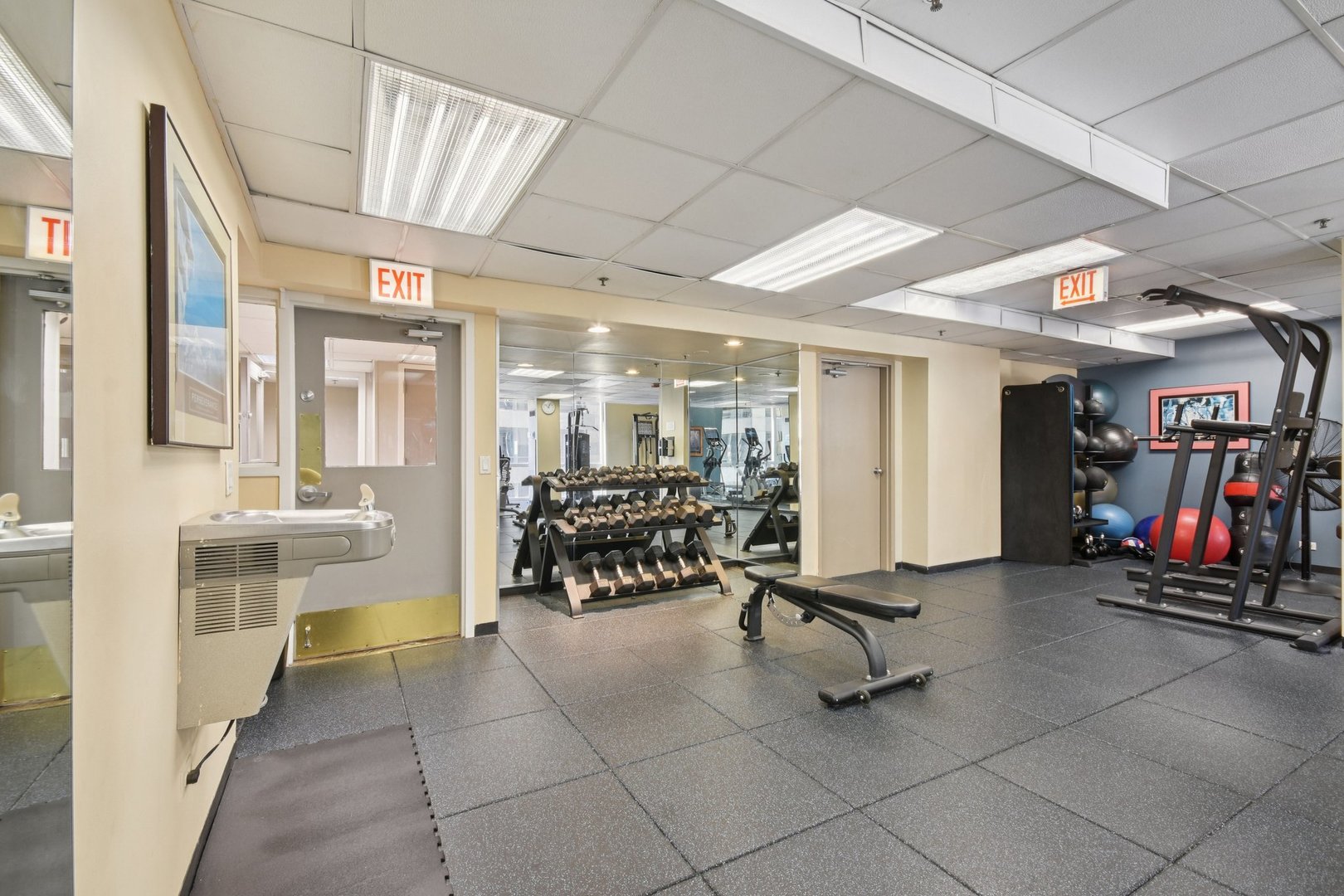 200 North Dearborn Street, Unit 1303 Chicago, IL 60601 - Photo 26 of 32 a view of a room with gym equipment