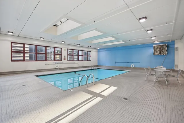 a view of a living room and dining room
