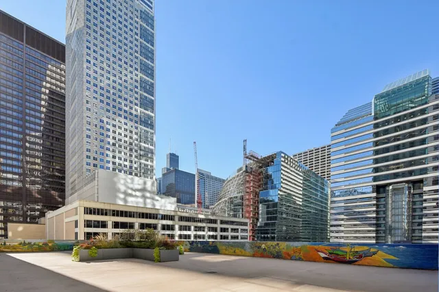 a view of a building with a garden