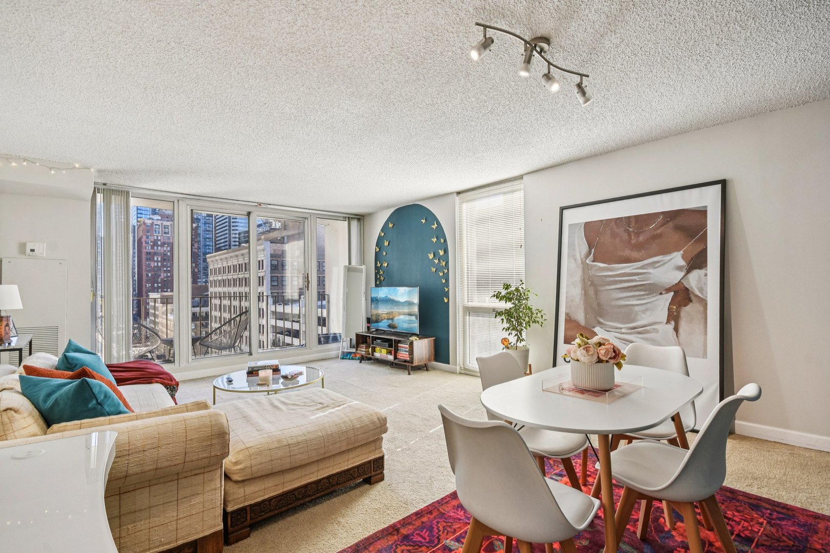 200 North Dearborn Street, Unit 1303 Chicago, IL 60601 - Photo 3 of 32 a living room with furniture and a large window