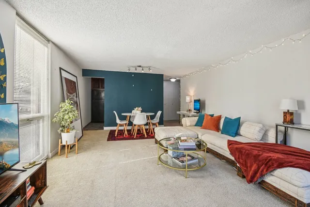 a living room with furniture and a couch