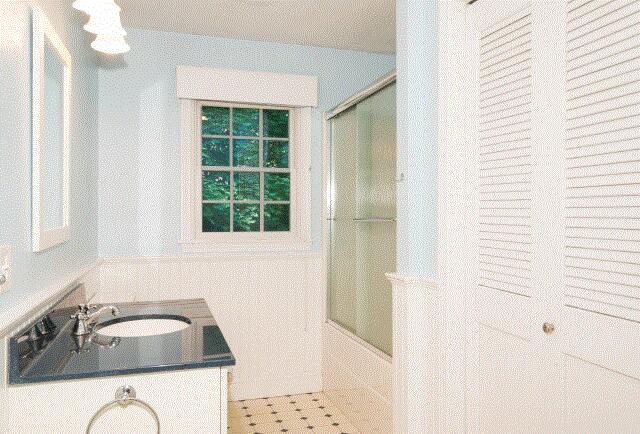17 Mcgregor Road Woods Hole, MA 02543 - Photo 12 of 17 a bathroom with a sink a bathtub and a window