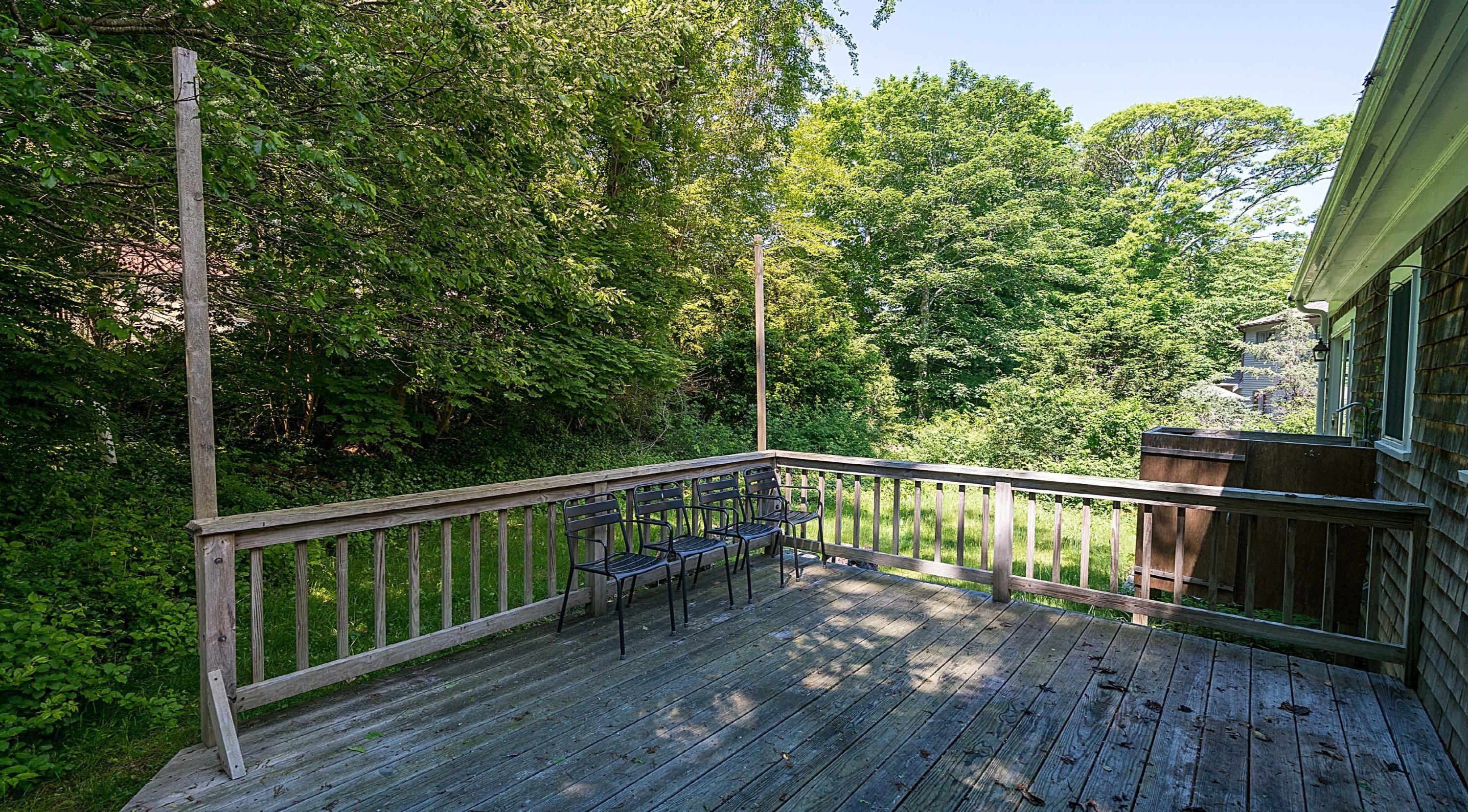 17 Mcgregor Road Woods Hole, MA 02543 - Photo 15 of 17 a view of a balcony with wooden floor