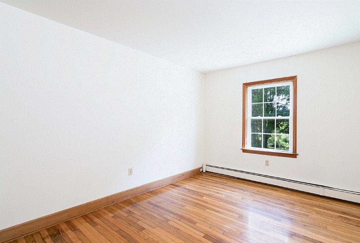 17 Mcgregor Road Woods Hole, MA 02543 - Photo 8 of 17 an empty room with wooden floor and windows