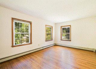 17 Mcgregor Road Woods Hole, MA 02543 - Photo 9 of 17 a view of an empty room with wooden floor and a window