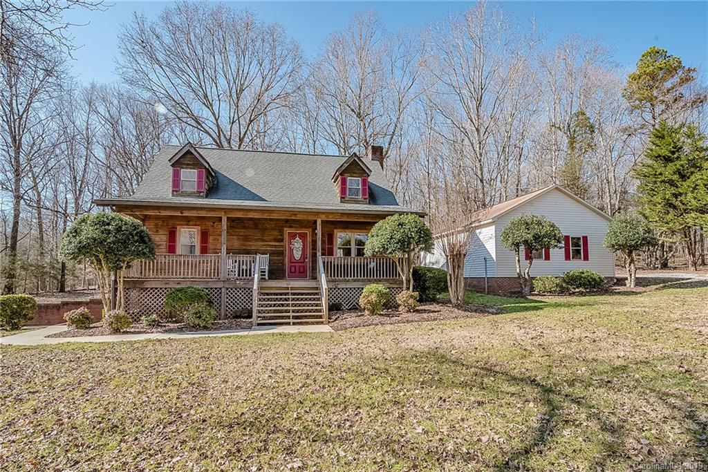 2350 Phifer Road Cleveland, NC 27013 - Photo 1 of 36 a front view of a house with a yard and garage