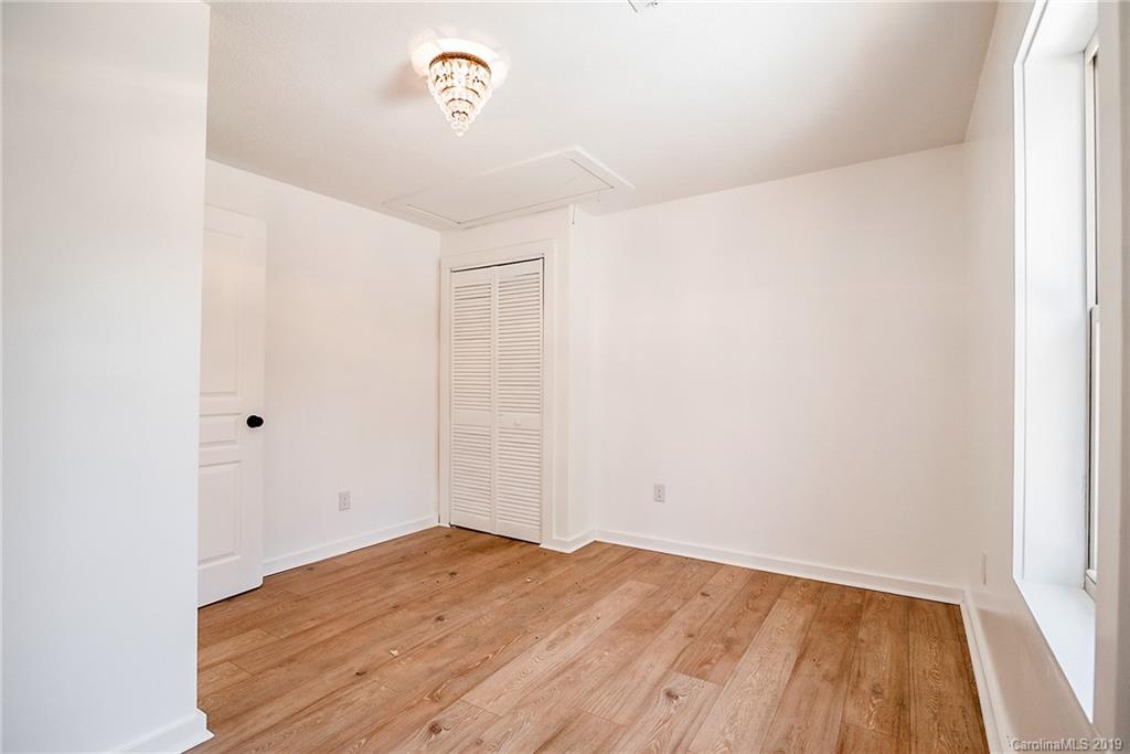 2350 Phifer Road Cleveland, NC 27013 - Photo 24 of 36 a view of empty room with wooden floor