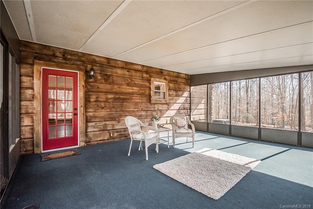 2350 Phifer Road Cleveland, NC 27013 - Photo 26 of 36 a dining room with furniture and a floor to ceiling window