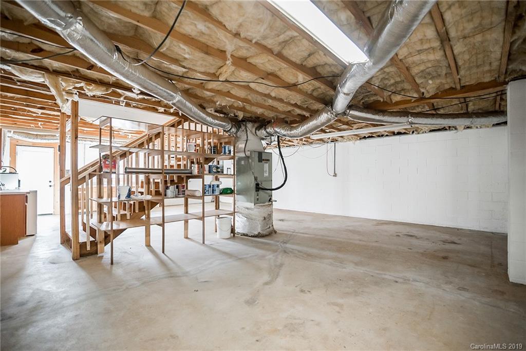 2350 Phifer Road Cleveland, NC 27013 - Photo 27 of 36 a view of a room with racks on wall