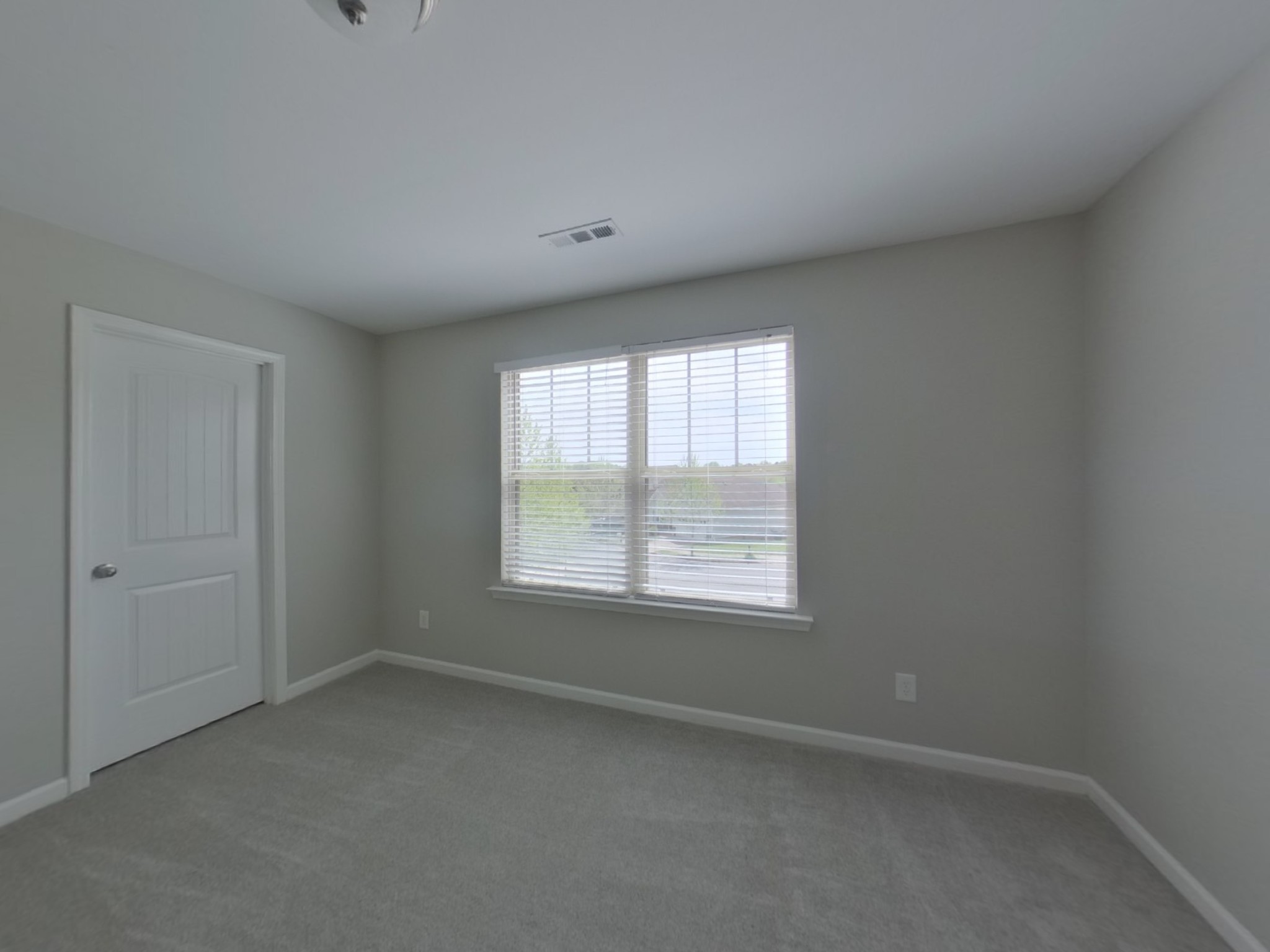 7114 Colquitt Way Fairview, TN 37062 - Photo 13 of 16 an empty room with a window