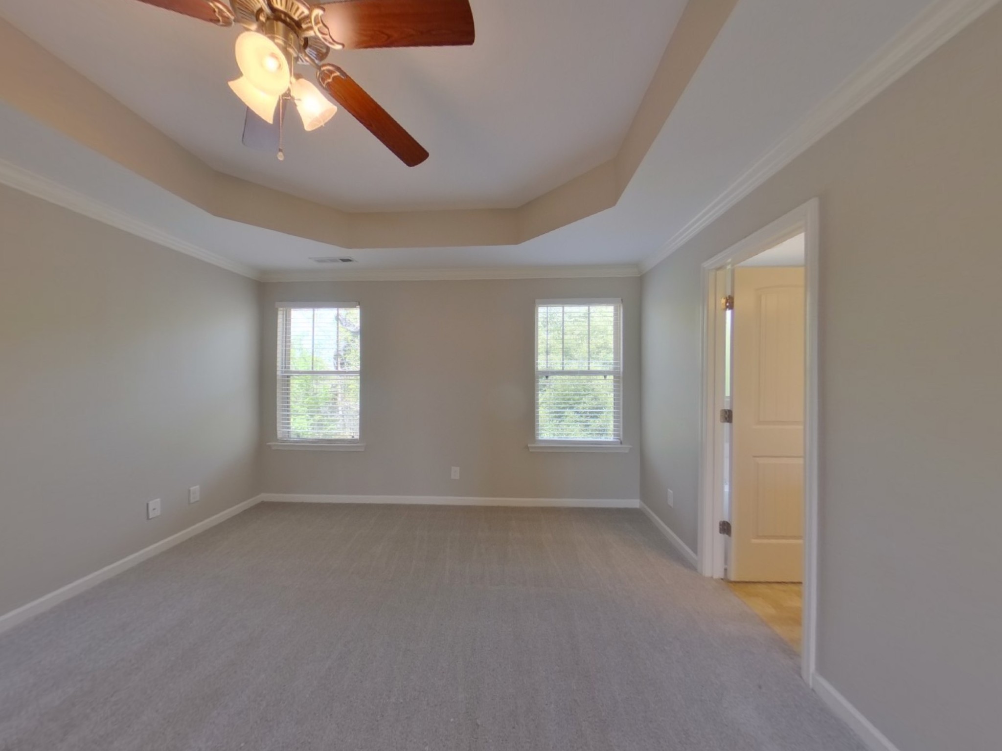 7114 Colquitt Way Fairview, TN 37062 - Photo 9 of 16 an empty room with a window and a fan