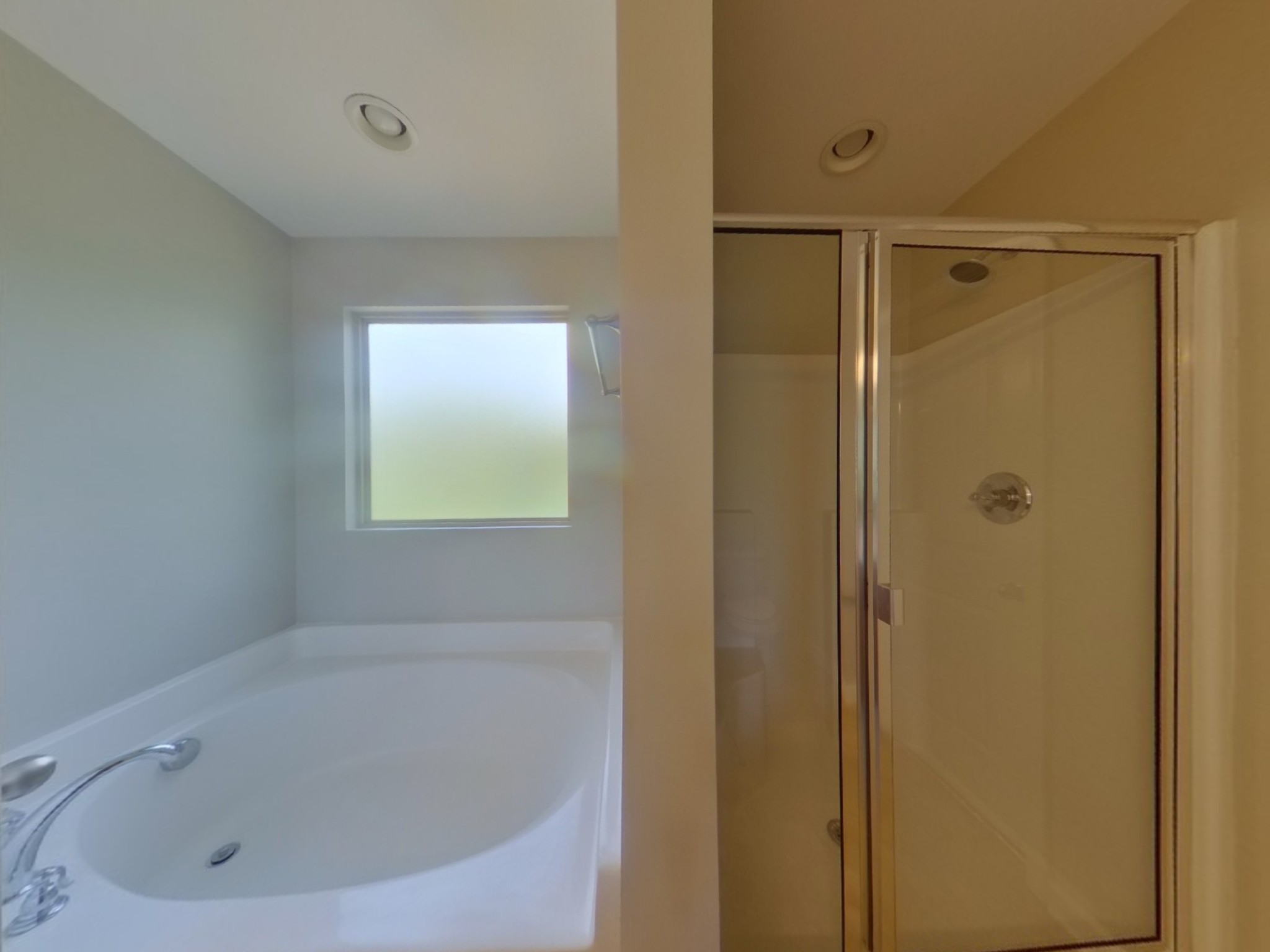 7114 Colquitt Way Fairview, TN 37062 - Photo 10 of 16 a bathroom with a tub and shower