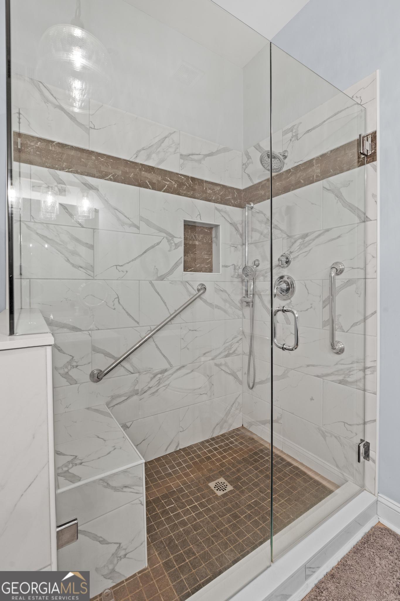 291 Lora Smith Road Newnan, GA 30265 - Photo 23 of 37 a bathroom with a shower