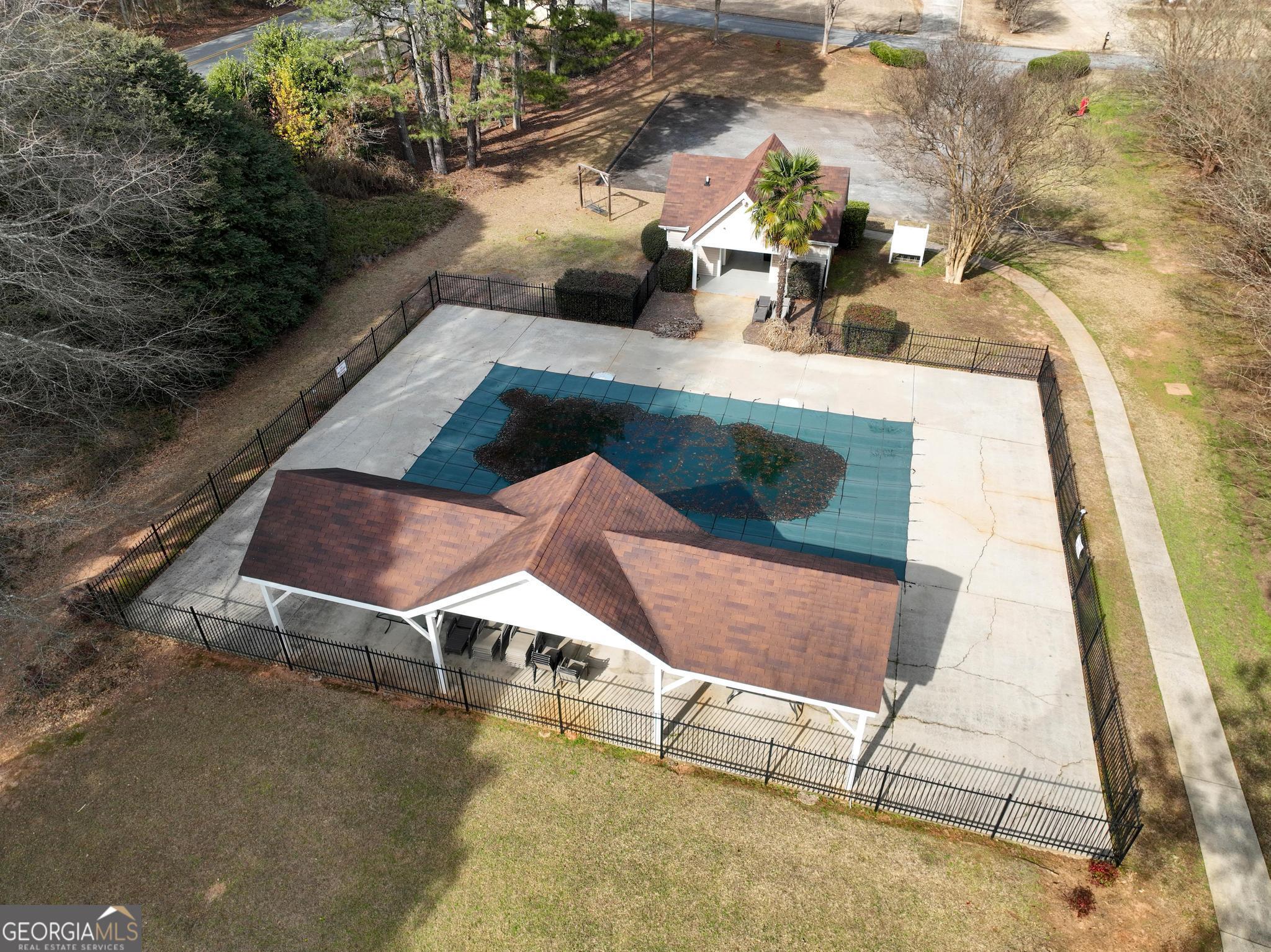 291 Lora Smith Road Newnan, GA 30265 - Photo 36 of 37 a view of a chairs and table in the terrace