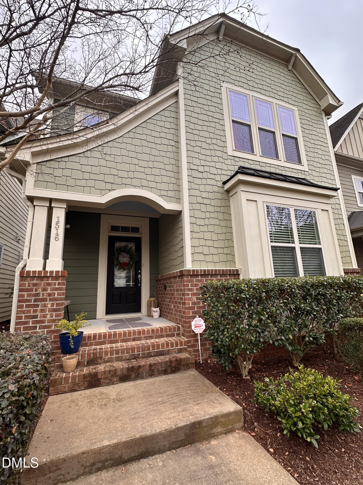 1516 Crafton Way Raleigh, NC 27607 - Photo 2 of 4 a front view of a house