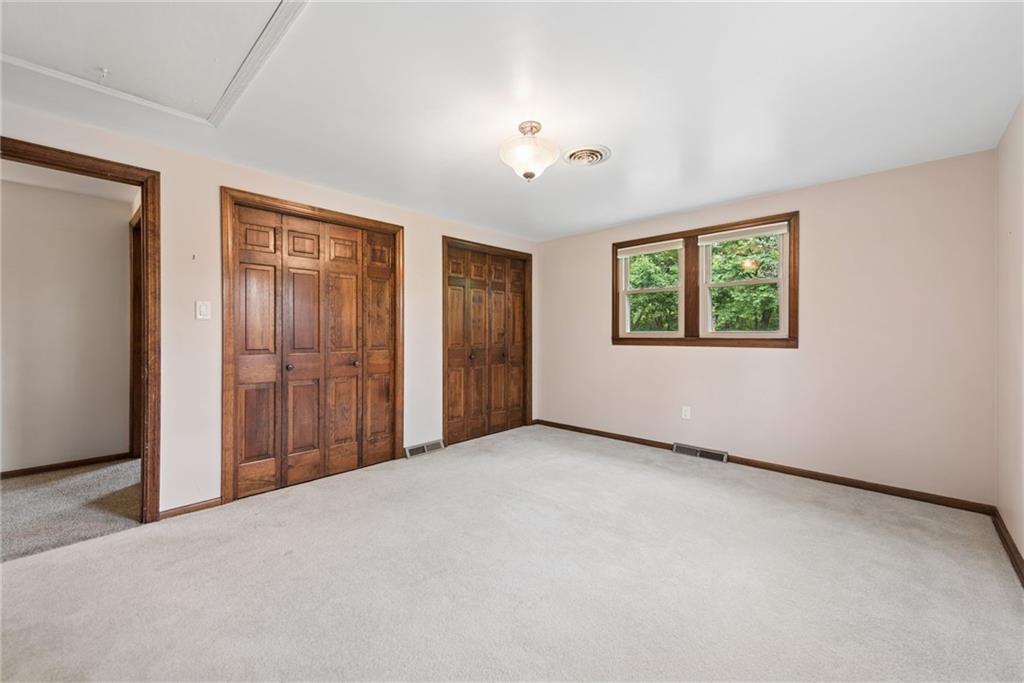 22 Buzzardtown Road Irwin, PA 15642 - Photo 29 of 44 an empty room with windows and closet