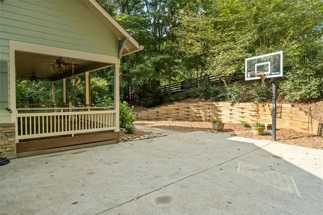 a view of a porch with wooden floor and outdoor space