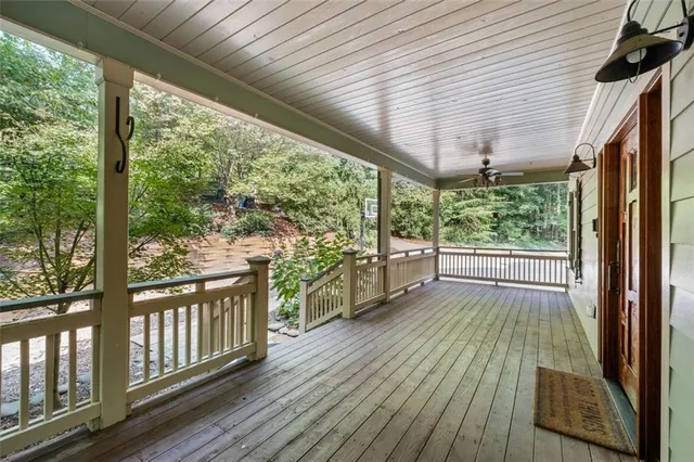 a view of entryway with wooden floor and stairs