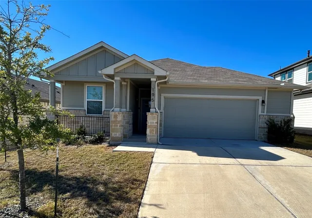 a front view of house with yard