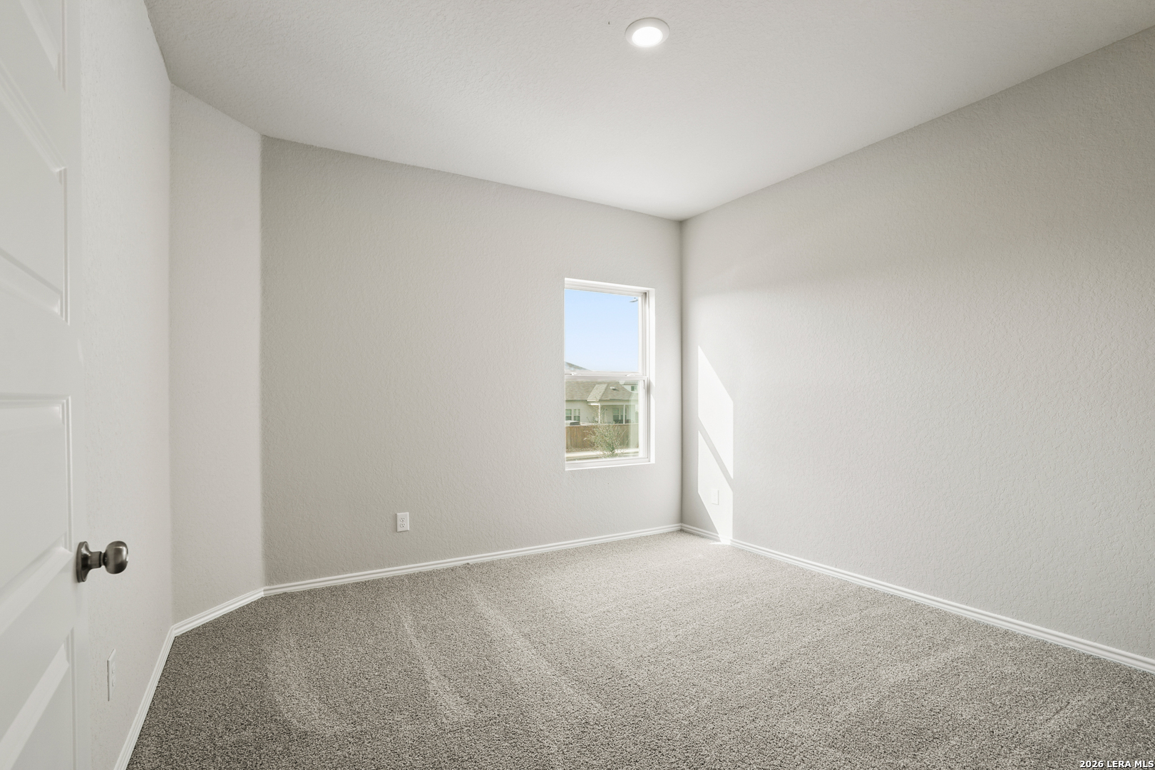 4951 Blue Ranch San Antonio, TX 78222 - Photo 12 of 36 a view of an empty room with a window