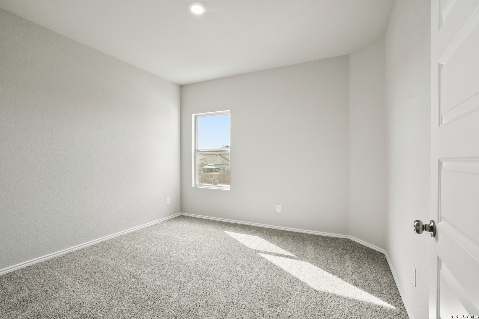 4951 Blue Ranch San Antonio, TX 78222 - Photo 17 of 36 an empty room with a window