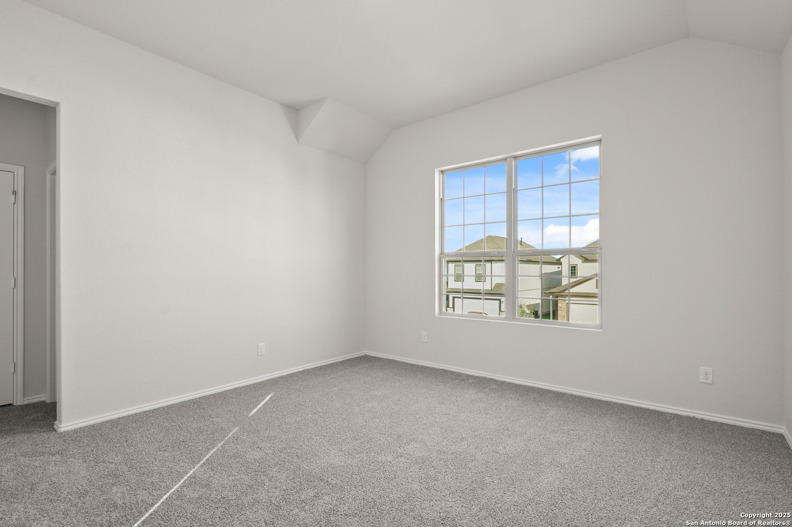 4951 Blue Ranch San Antonio, TX 78222 - Photo 20 of 24 an empty room with a window