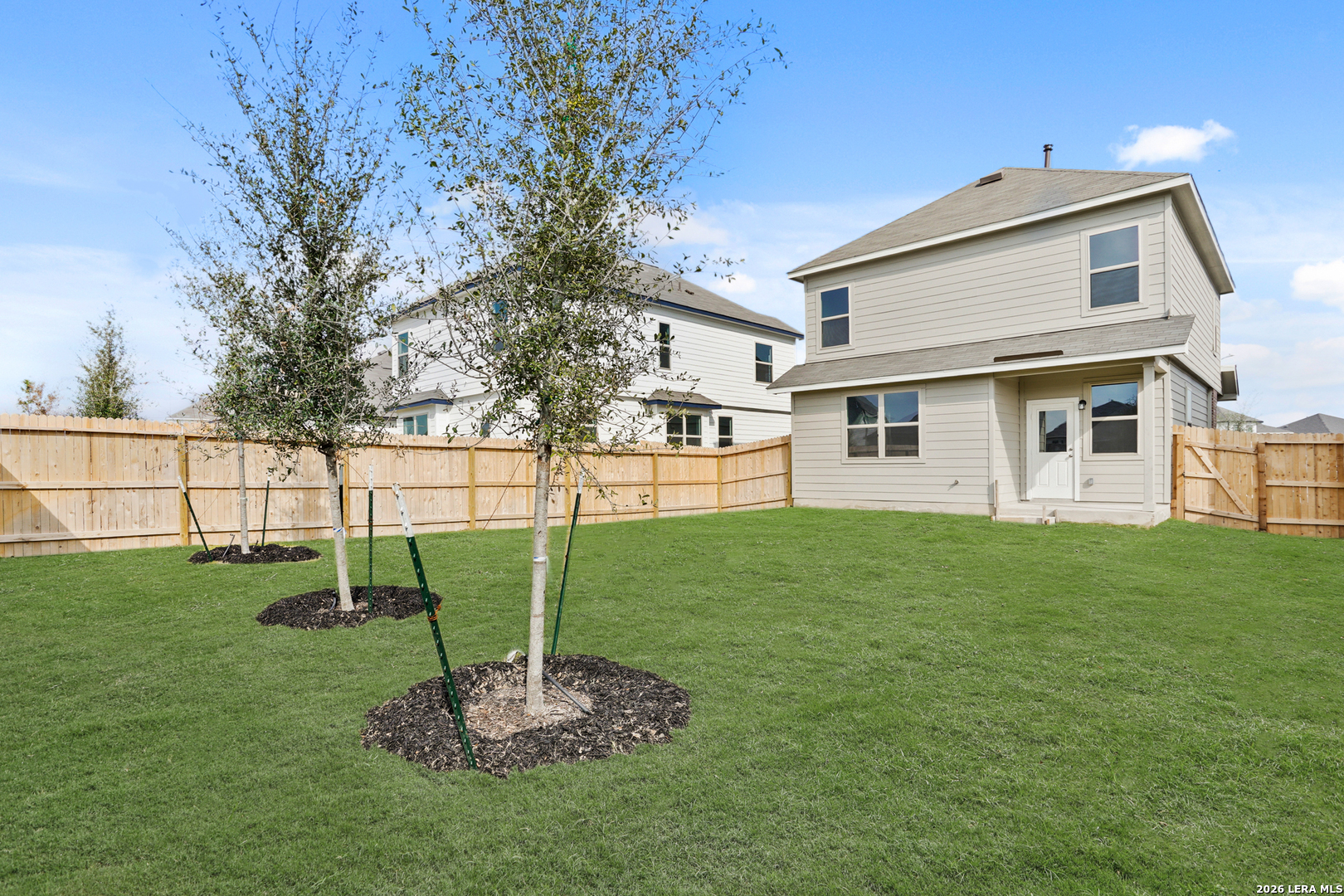 4951 Blue Ranch San Antonio, TX 78222 - Photo 26 of 36 a backyard of a house with lots of green space