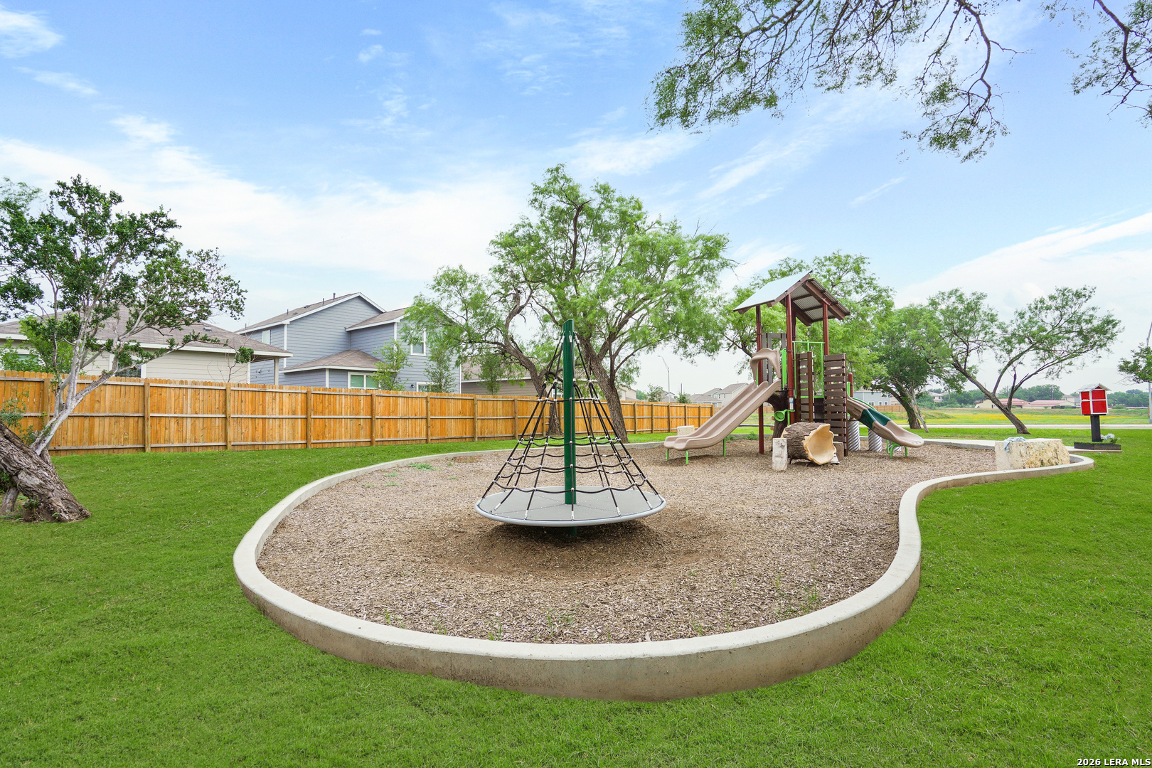 4951 Blue Ranch San Antonio, TX 78222 - Photo 32 of 36 a view of a swimming pool with a yard