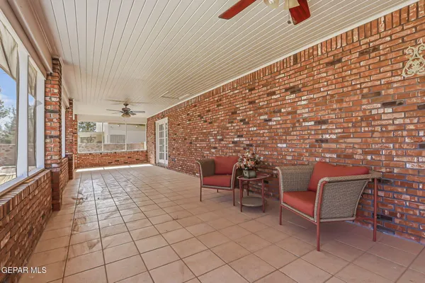 a view of an outdoor space with lounge chair