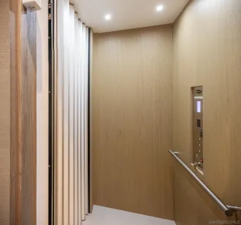 a view of a hallway with closet