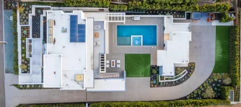 aerial view of a house with fountain