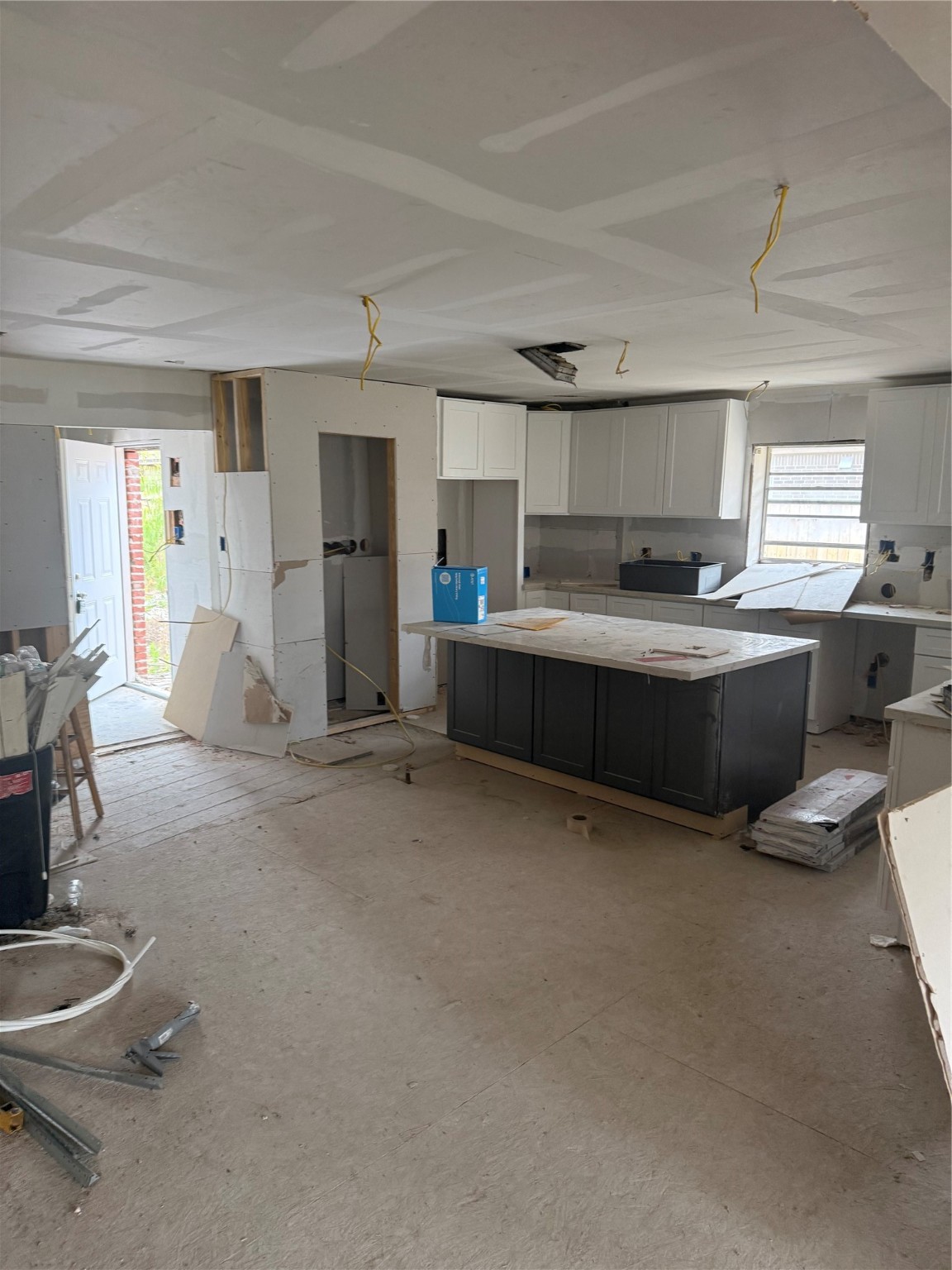 4102 Charleston Street Houston, TX 77021 - Photo 3 of 11 a living room with furniture a window and kitchen view