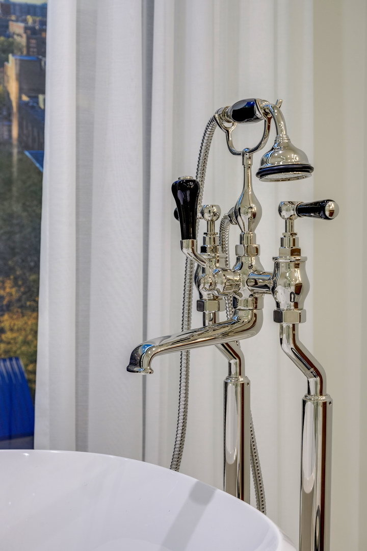 21 North May Street, Unit 604 Chicago, IL 60607 - Photo 22 of 25 a bathroom with a sink and mirror