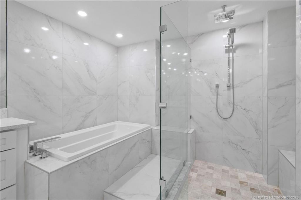 8650 South Ocean Drive, Unit 306 Jensen Beach, FL 34957 - Photo 28 of 51 a bathroom with a shower and a shower