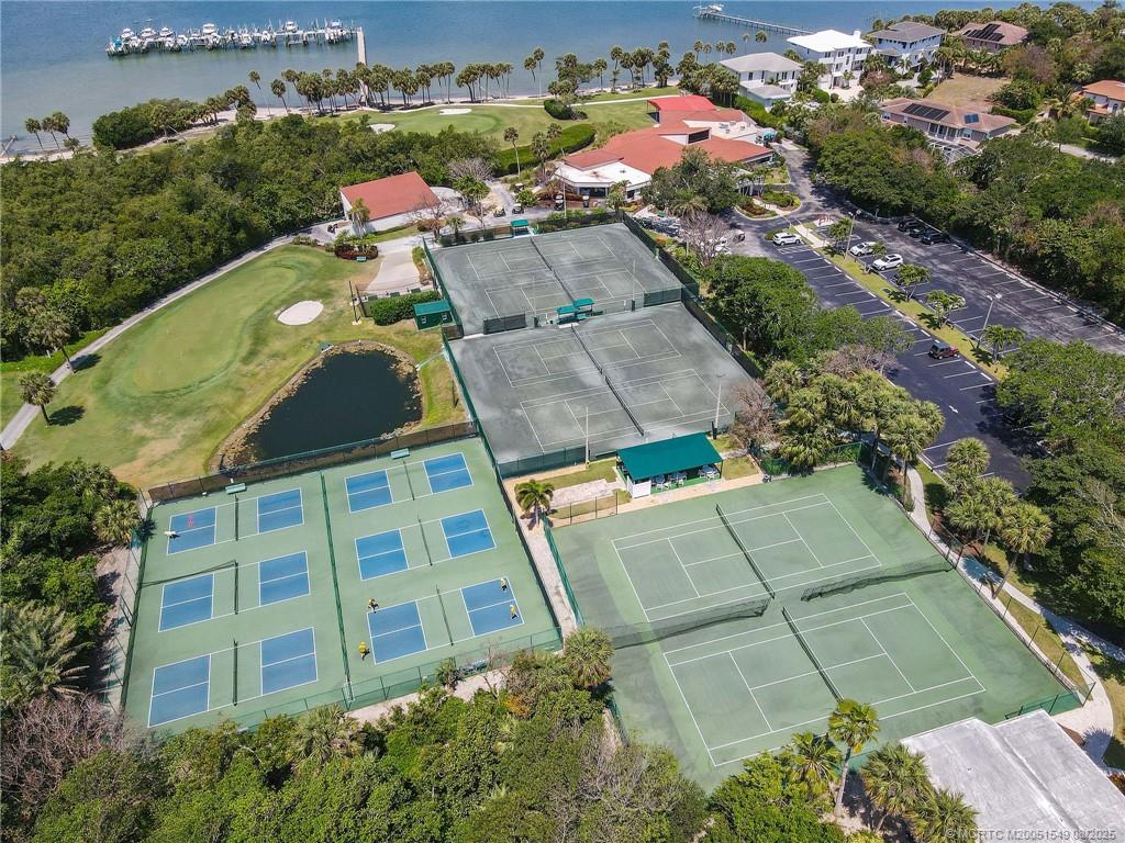 8650 South Ocean Drive, Unit 306 Jensen Beach, FL 34957 - Photo 3 of 51 an aerial view of residential houses with outdoor space