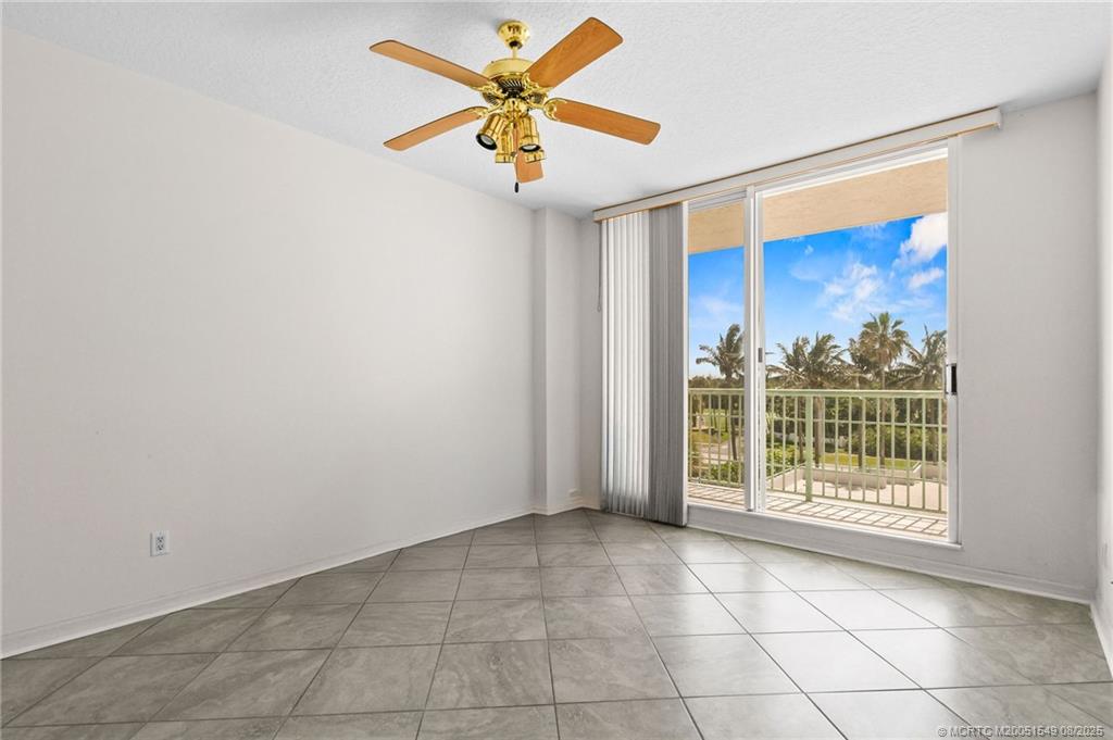 8650 South Ocean Drive, Unit 306 Jensen Beach, FL 34957 - Photo 33 of 51 a view of an empty room with a window