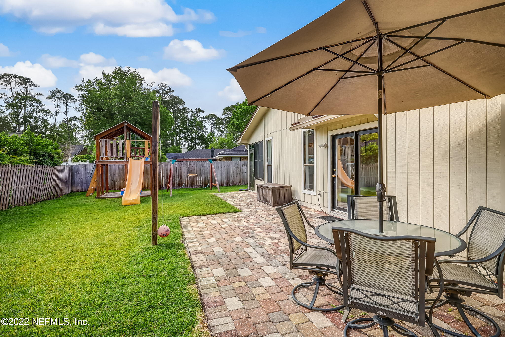 11476 Scott Mill Road Jacksonville, FL 32223 - Photo 38 of 47 Backyard with Brick Patio