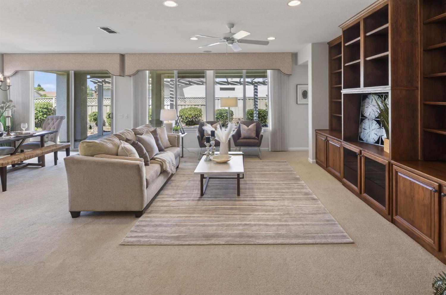 1260 Freschi Lane Lincoln, CA 95648 - Photo 16 of 60 a living room with furniture and a floor to ceiling window