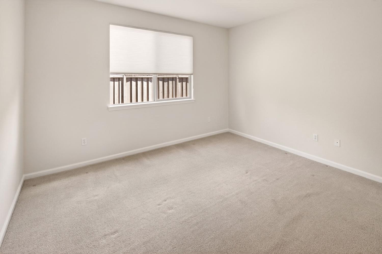 1260 Freschi Lane Lincoln, CA 95648 - Photo 33 of 60 an empty room with windows