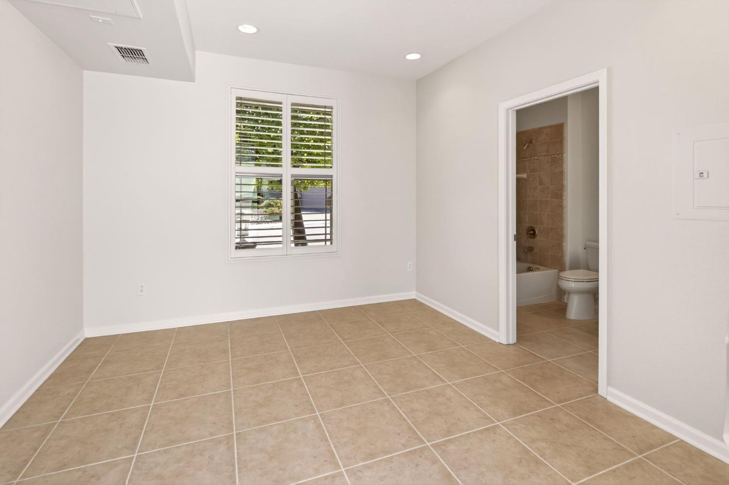 1260 Freschi Lane Lincoln, CA 95648 - Photo 38 of 60 a view of an empty room with a window