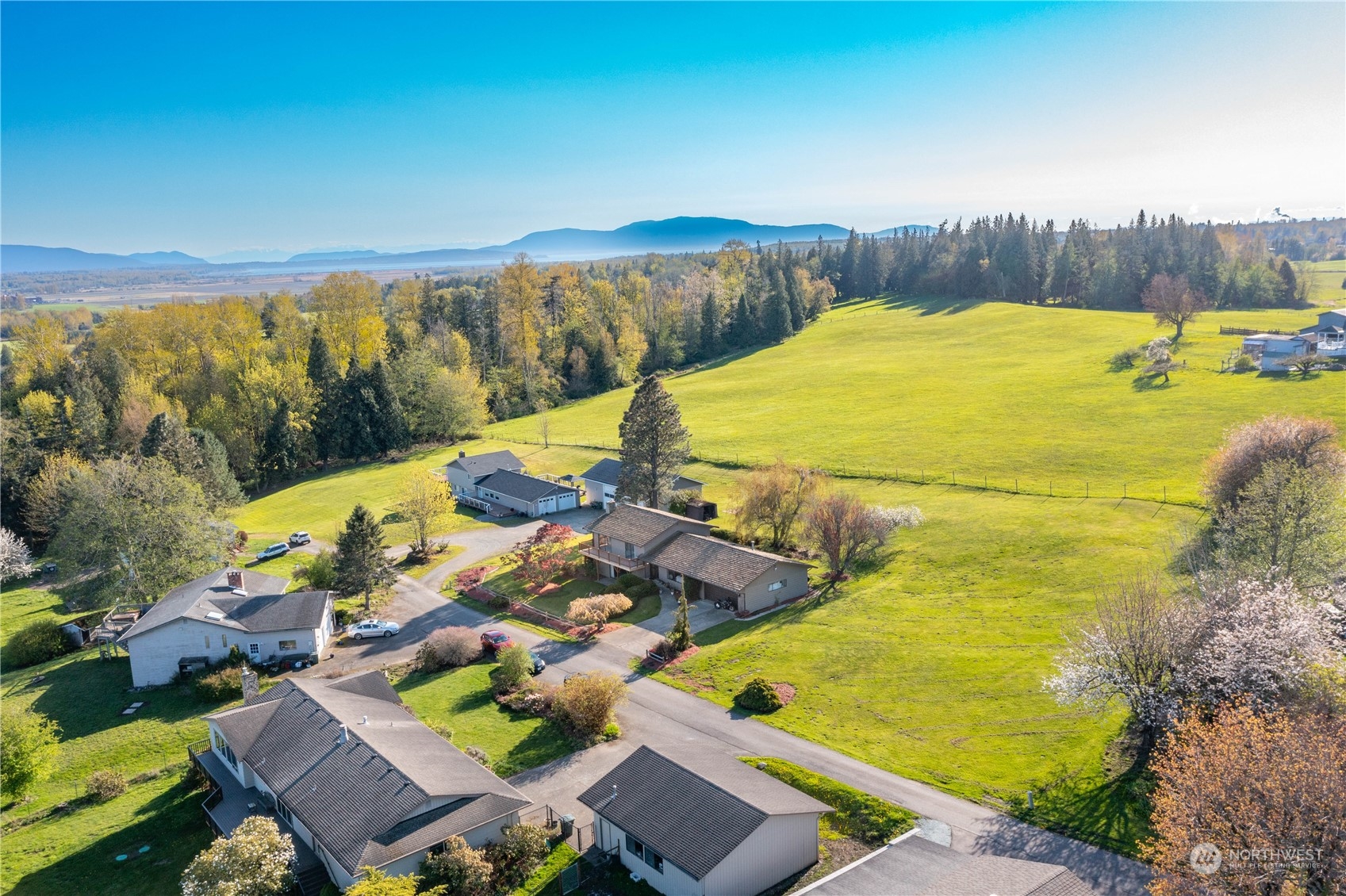 2585 Mountain View Road Ferndale, WA 98248 - Photo 1 of 40 an aerial view of residential houses with outdoor space