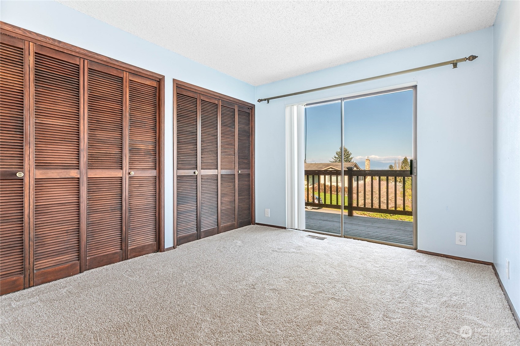 2585 Mountain View Road Ferndale, WA 98248 - Photo 26 of 40 a view of an empty room with a balcony