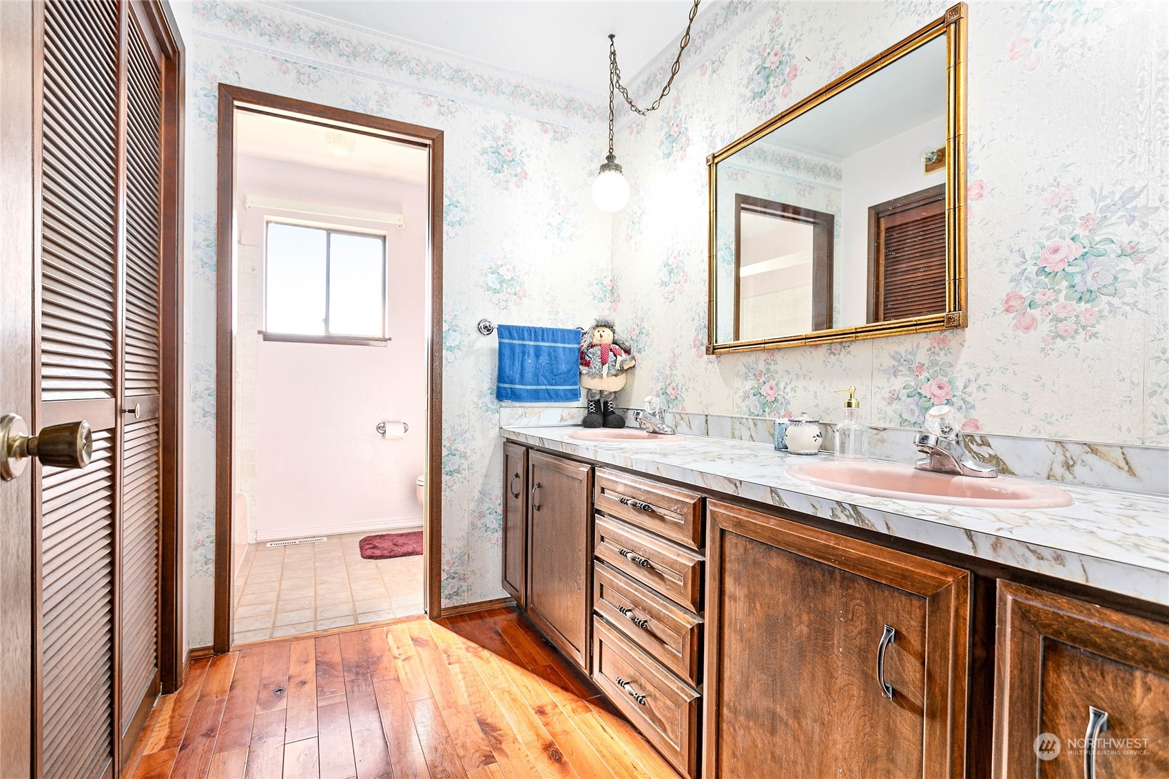 2585 Mountain View Road Ferndale, WA 98248 - Photo 27 of 40 a en suite bathroom with a sink a mirror and a shower