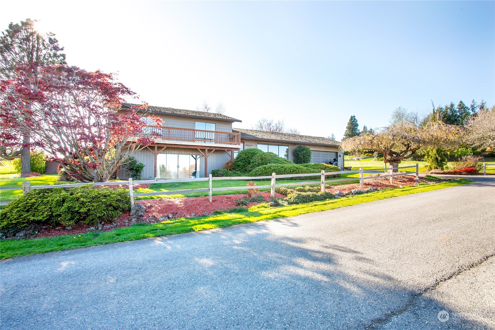 2585 Mountain View Road Ferndale, WA 98248 - Photo 3 of 40 a view of building with garden and tall trees