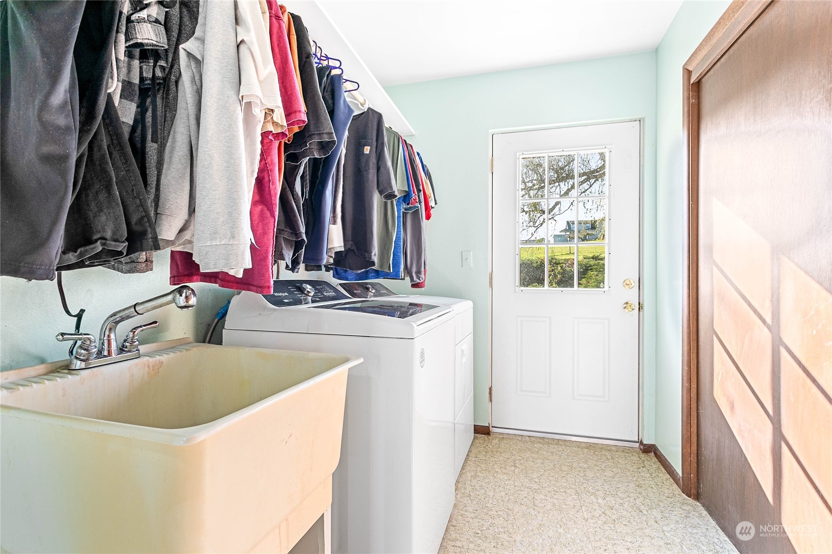 2585 Mountain View Road Ferndale, WA 98248 - Photo 35 of 40 a bathroom with a sink and a mirror