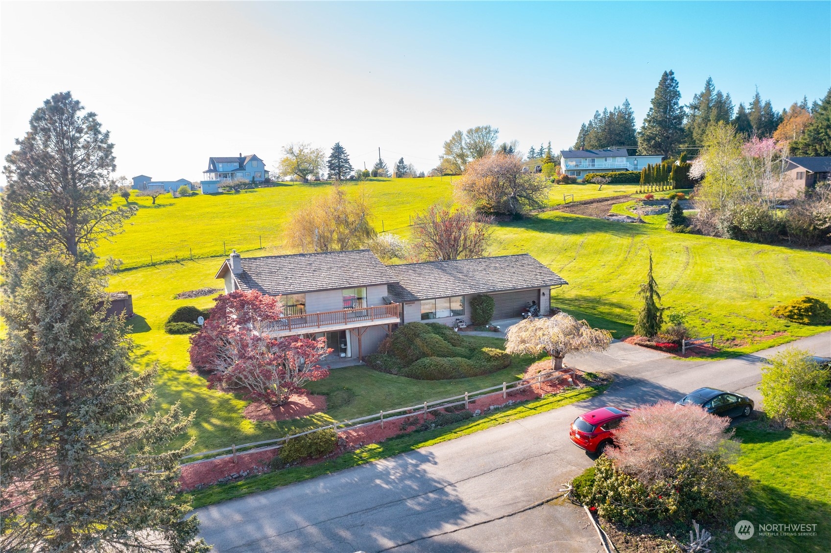 2585 Mountain View Road Ferndale, WA 98248 - Photo 5 of 40 an aerial view of a house with a swimming pool a yard and outdoor seating