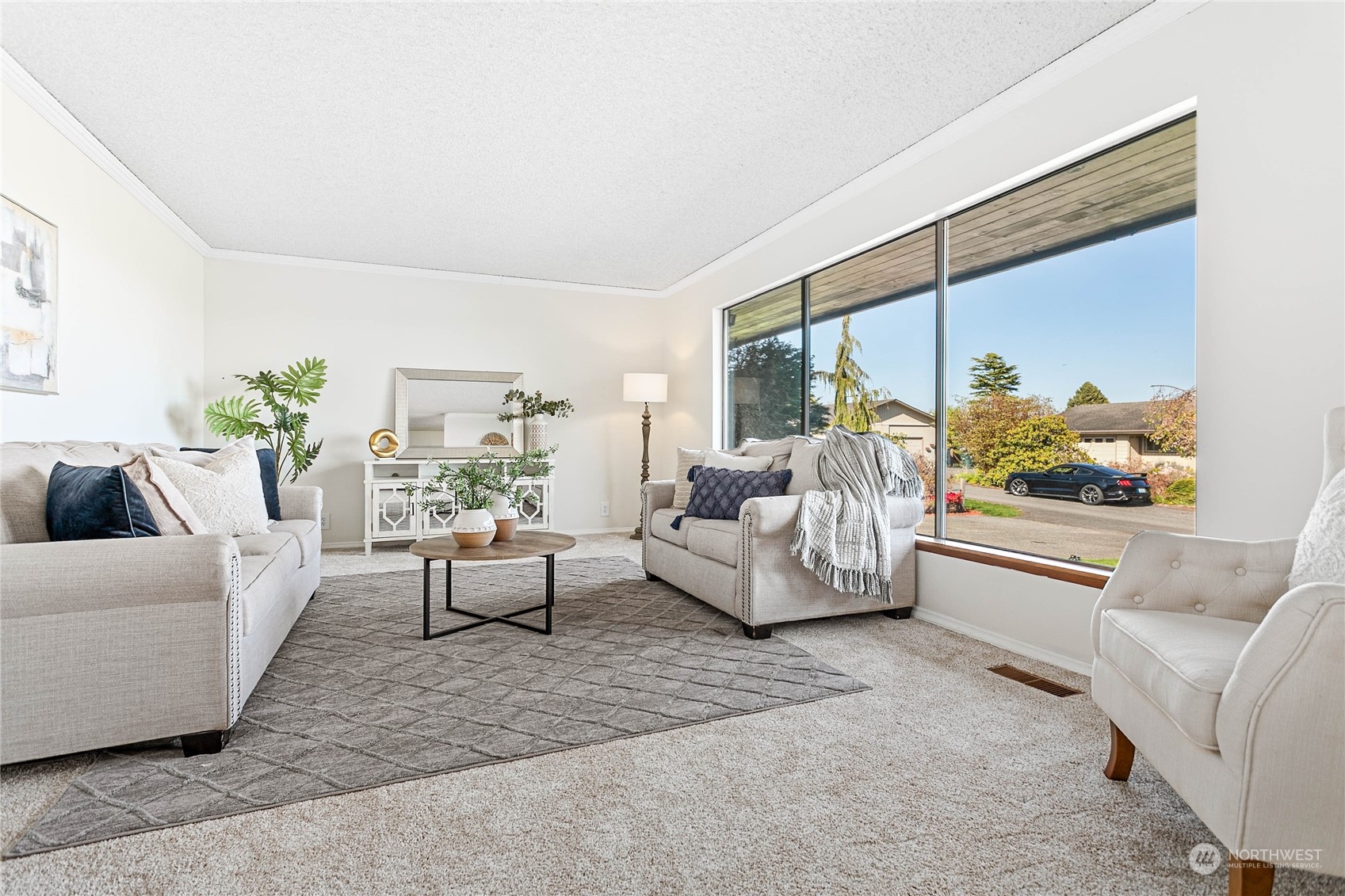 2585 Mountain View Road Ferndale, WA 98248 - Photo 7 of 40 a living room with furniture and a large window
