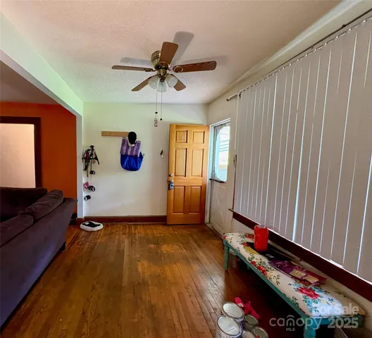 a view of a livingroom with furniture window and outside view