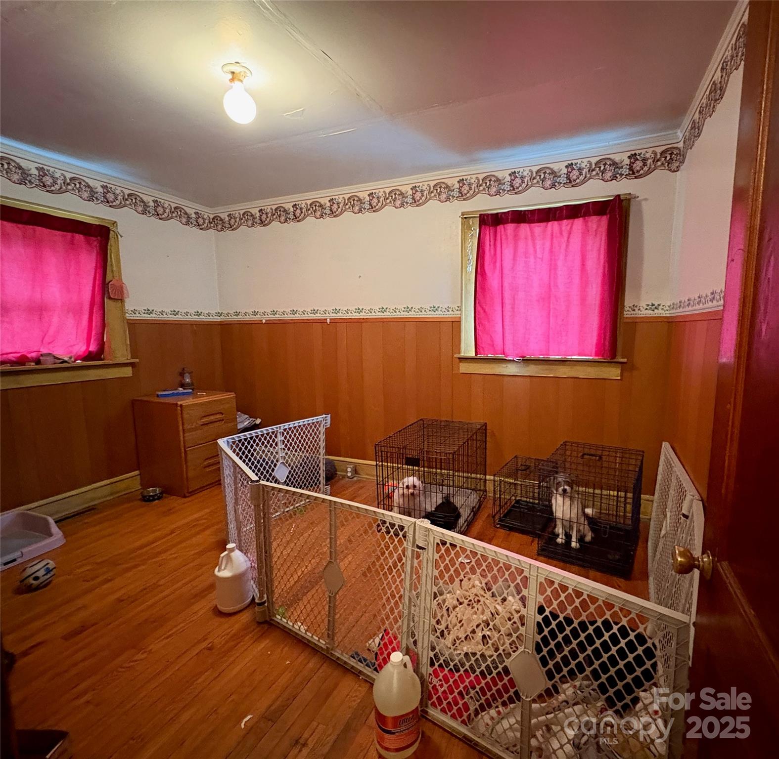 78 Moffitt Hill Church Road Old Fort, NC 28762 - Photo 29 of 37 a room with furniture mirror and a wooden floor