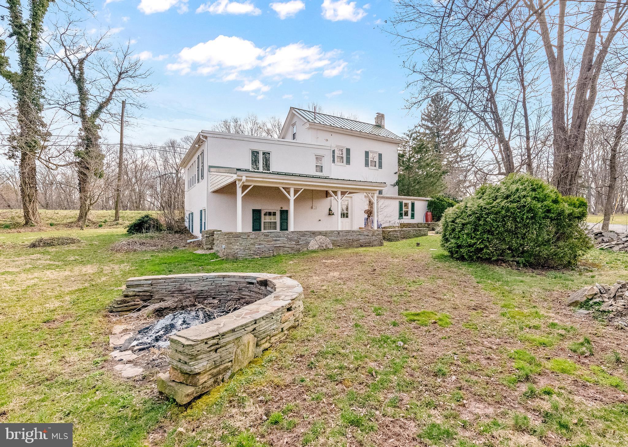 69 Kolb Road Spring City, PA 19475 - Photo 19 of 20 back yard fire pit and covered back patio